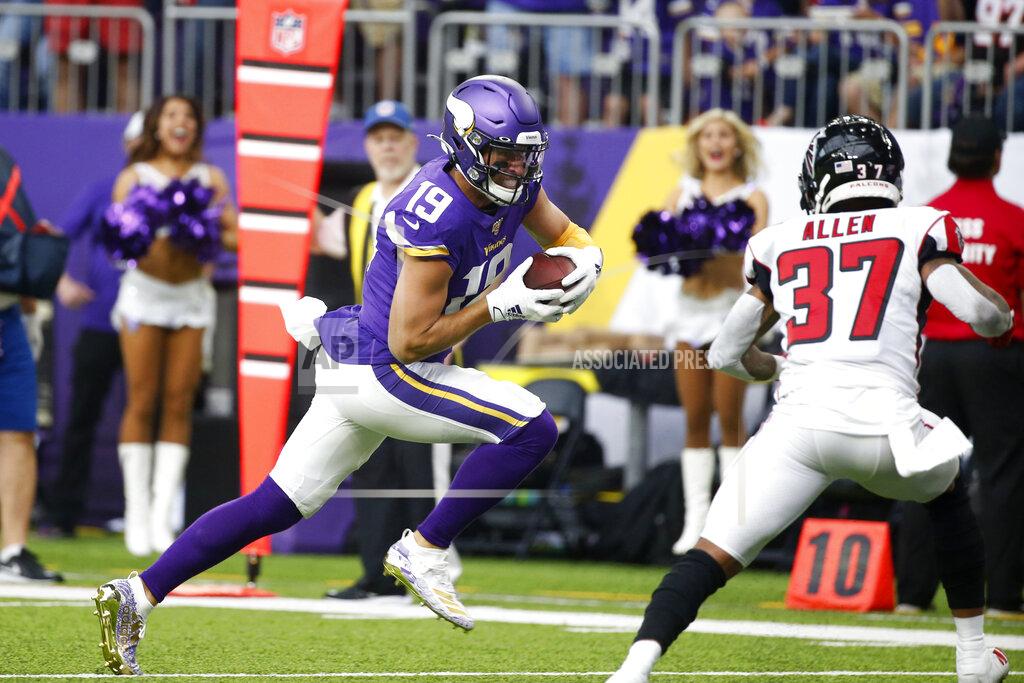 Bruce Kluckhohn Minnesota Vikings wide receiver Adam Thielen (19) runs from Atlanta Falcons free safety Ricardo Allen (37) during a 23-yard touchdown reception in the first half of an NFL football game, Sunday, Sept. 8, 2019, in Minneapolis. (AP Photo/Bruce Kluckhohn)