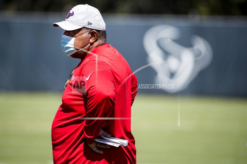 Houston Texans NFL football interim head coach Romeo Crennel runs his first practice leading the team Wednesday, Oct. 7, 2020, at The Houston Methodist Training Center in Houston. (Brett Coomer/Houston Chronicle via AP)