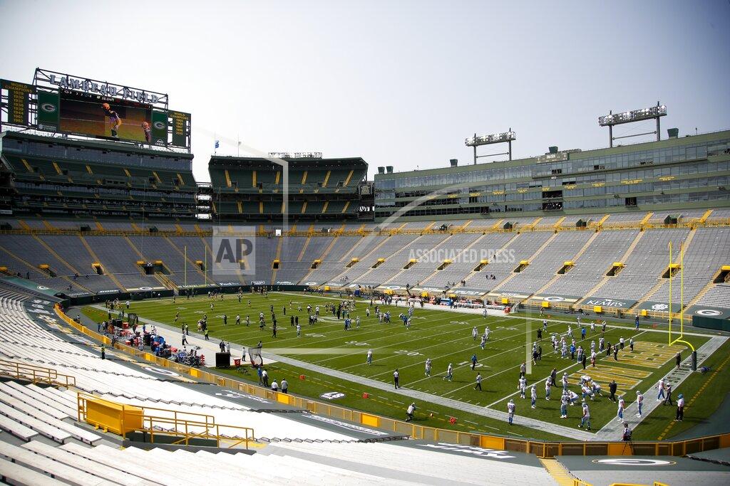 Matt Ludtke Players warm up before an NFL football game between the Green Bay Packers and the Detroit Lions Sunday, Sept. 20, 2020, in Green Bay, Wis. (AP Photo/Matt Ludtke)