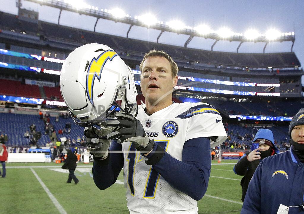 Steven Senne FILE - In this Sunday, Jan. 13, 2019, file photo, Los Angeles Chargers quarterback Philip Rivers leaves the field after an NFL divisional playoff football game against the New England Patriots in Foxborough, Mass. Rivers fought back tears as he accepted an award from the San Diego Sports Association at its annual Salute to the Champions dinner Thursday, Jan. 31, 2019. (AP Photo/Steven Senne, File)