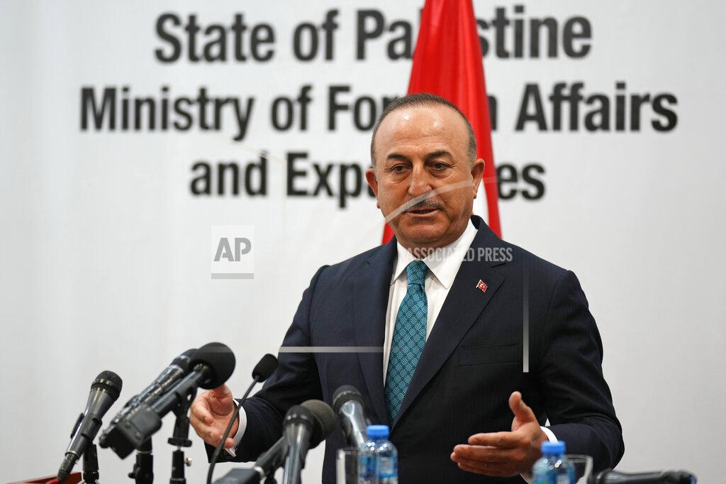 Majdi Mohammed Turkish Foreign Minister Mevlut Cavusoglu speaks during a joint statement with his Palestinian counterpart Riad al-Malki in the West Bank town of Ramallah, Tuesday, May 24, 2022. (AP Photo/Majdi Mohammed)