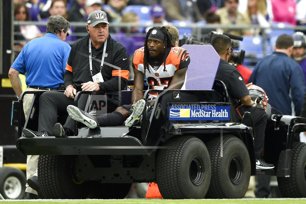 Gail Burton Cincinnati Bengals cornerback Dre Kirkpatrick (27) sits on the back of a cart while being taking off the field after an injury against the Baltimore Ravens during the first half of a NFL football game Sunday, Oct. 13, 2019, in Baltimore. (AP Photo/Gail Burton)