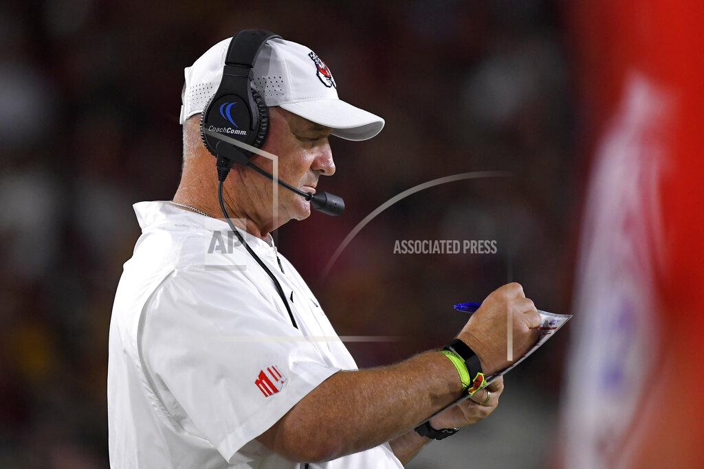Mark J. Terrill Fresno State head coach Jeff Tedford stands on the sidelines during the second half of an NCAA college football game against Southern California Saturday, Aug. 31, 2019, in Los Angeles. USC won 31-23. (AP Photo/Mark J. Terrill)