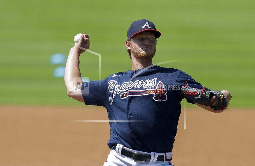 Brynn Anderson Atlanta Braves' Mike Soroka throws during team baseball practice at Truist Park on Friday, July 3, 2020, in Atlanta. (AP Photo/Brynn Anderson)