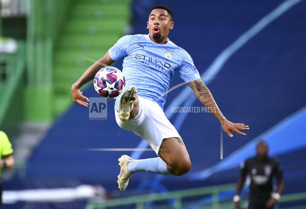 Franck Fife Manchester City's Gabriel Jesus plays at the ball during the Champions League quarterfinal match between Manchester City and Lyon at the Jose Alvalade stadium in Lisbon, Portugal, Saturday, Aug. 15, 2020. (Franck Fife/Pool Photo via AP)