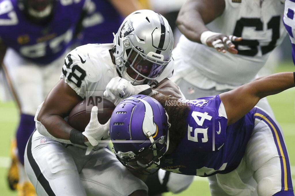 Jim Mone Oakland Raiders running back Josh Jacobs (28) is tackled by Minnesota Vikings middle linebacker Eric Kendricks (54) during the second half of an NFL football game, Sunday, Sept. 22, 2019, in Minneapolis. (AP Photo/Jim Mone)