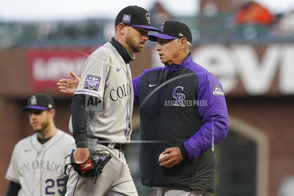 Jeff Chiu Colorado Rockies pitcher Austin Gomber, center left, walks off the mound as he is taken out for a relief pitcher by manager Bud Black, right, during the second inning of a baseball game against the San Francisco Giants in San Francisco, Monday, April 26, 2021. (AP Photo/Jeff Chiu)