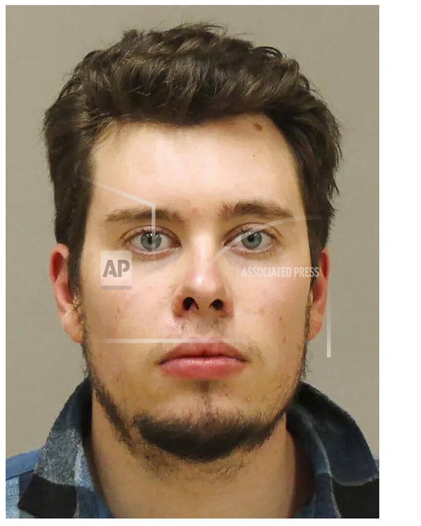 Uncredited In a photo provided by the Kent County Sheriff, Ty Garbin is shown in a booking photo. Garbin is one of several people charged with plotting to kidnap Michigan Democratic Gov. Gretchen Whitmer, authorities said Thursday, Oct. 8, 2020, in announcing charges in an alleged scheme that involved months of planning and even rehearsals to snatch Whitmer from her vacation home. (Kent County Sheriff via AP)