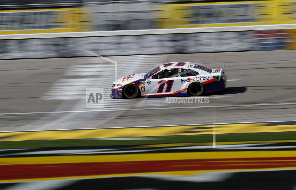 John Locher Denny Hamlin (11) drives during a NASCAR Cup Series auto race at the Las Vegas Motor Speedway, Sunday, March 3, 2019, in Las Vegas. (AP Photo/John Locher)