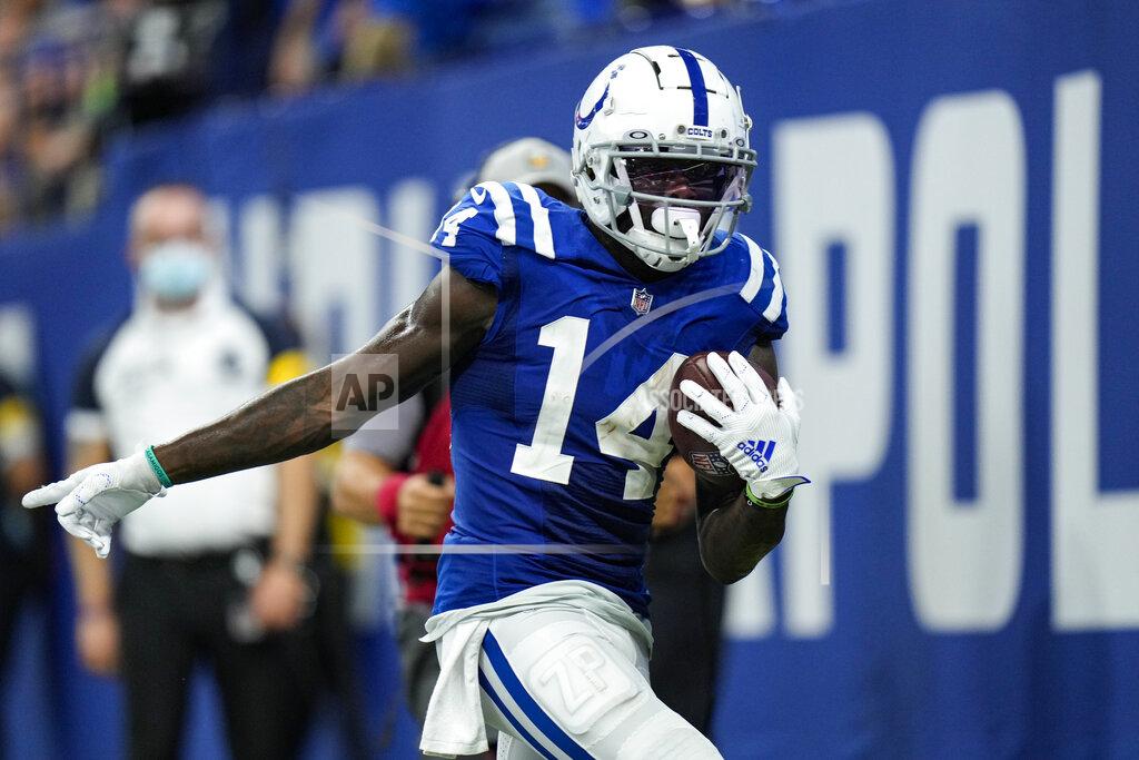 Aj Mast Indianapolis Colts wide receiver Zach Pascal (14) scores a touchdown against the Seattle Seahawks during the second half of an NFL football game in Indianapolis, Sunday, Sept. 12, 2021. (AP Photo/AJ Mast)