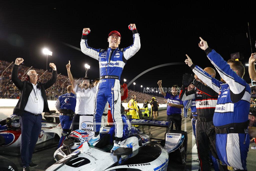 Jeff Roberson Takuma Sato celebrates after winning the IndyCar auto race at World Wide Technology Raceway on Saturday, Aug. 24, 2019, in Madison, Ill. (AP Photo/Jeff Roberson)