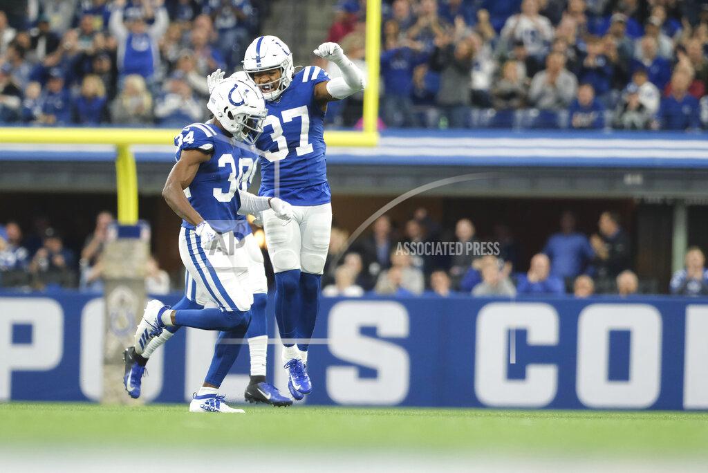 Aj Mast Indianapolis Colts cornerback Rock Ya-Sin (34) celebrates with Khari Willis (37) after Ya-Sin had an interception during the first half of an NFL football game against the Jacksonville Jaguars, Sunday, Nov. 17, 2019, in Indianapolis. (AP Photo/AJ Mast)