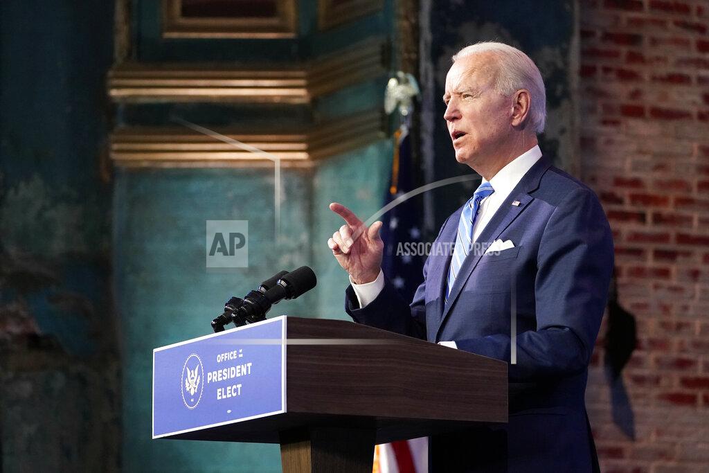 Matt Slocum President-elect Joe Biden speaks about the COVID-19 pandemic during an event at The Queen theater, Thursday, Jan. 14, 2021, in Wilmington, Del. (AP Photo/Matt Slocum)