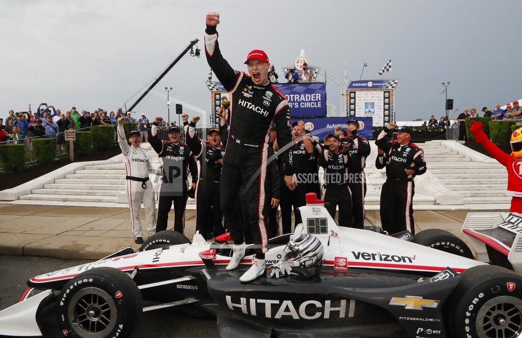 Carlos Osorio Josef Newgarden celebrates after winning the first race of the IndyCar Detroit Grand Prix auto racing doubleheader, Saturday, June 1, 2019, in Detroit. (AP Photo/Carlos Osorio)