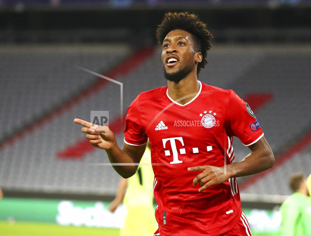 Matthias Schrader Bayern Munich's Kingsley Coman celebrates after scoring his team's fourth goal during the Champions League Group A soccer match between Bayern Munich and Atletico Madrid at the Allianz Arena in Munich, Germany, Wednesday, Oct. 21, 2020. (AP Photo/Matthias Schrader,Pool)