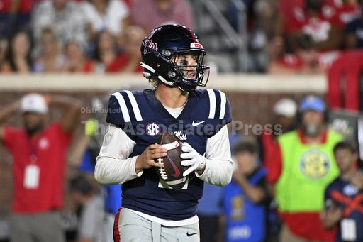 Dart runs for 2 TDs, throws for a third, as No. 17 Ole... - Vimarsana News