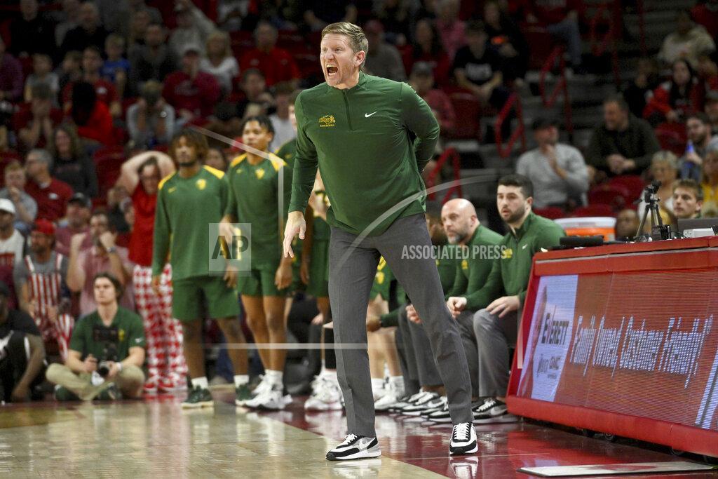 Michael Woods North Dakota State coach David Richman talks to his team as they run a play against Arkansas during the second half of an NCAA college basketball game Monday, Nov. 7, 2022, in Fayetteville, Ark. (AP Photo/Michael Woods)