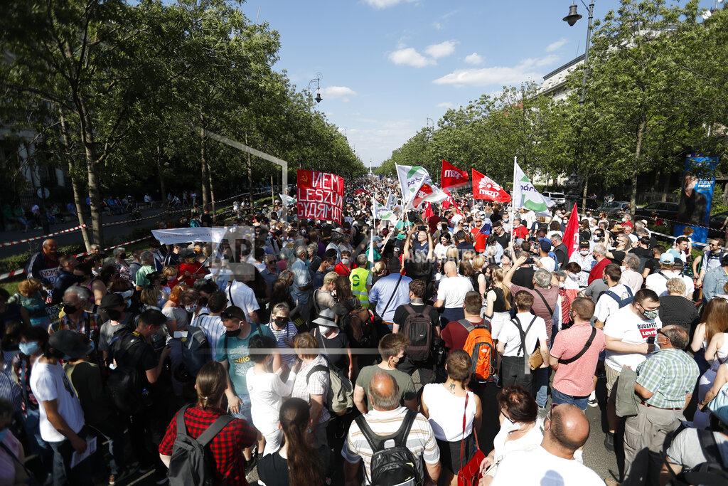 Laszlo Balogh Protesters gather in Budapest, Hungary, Saturday, June 5, 2021. Thousands of people gathered opposing the Hungarian government's plan of building a campus for China's Fudan University in Budapest. (AP Photo/Laszlo Balogh)