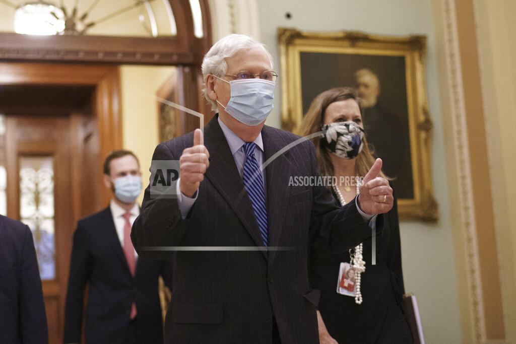 J. Scott Applewhite Senate Majority Leader Mitch McConnell, R-Ky., leaves the chamber after final roll call vote to put Amy Coney Barrett on the Supreme Court, at the Capitol in Washington, Monday, Oct. 26, 2020. (AP Photo/J. Scott Applewhite)