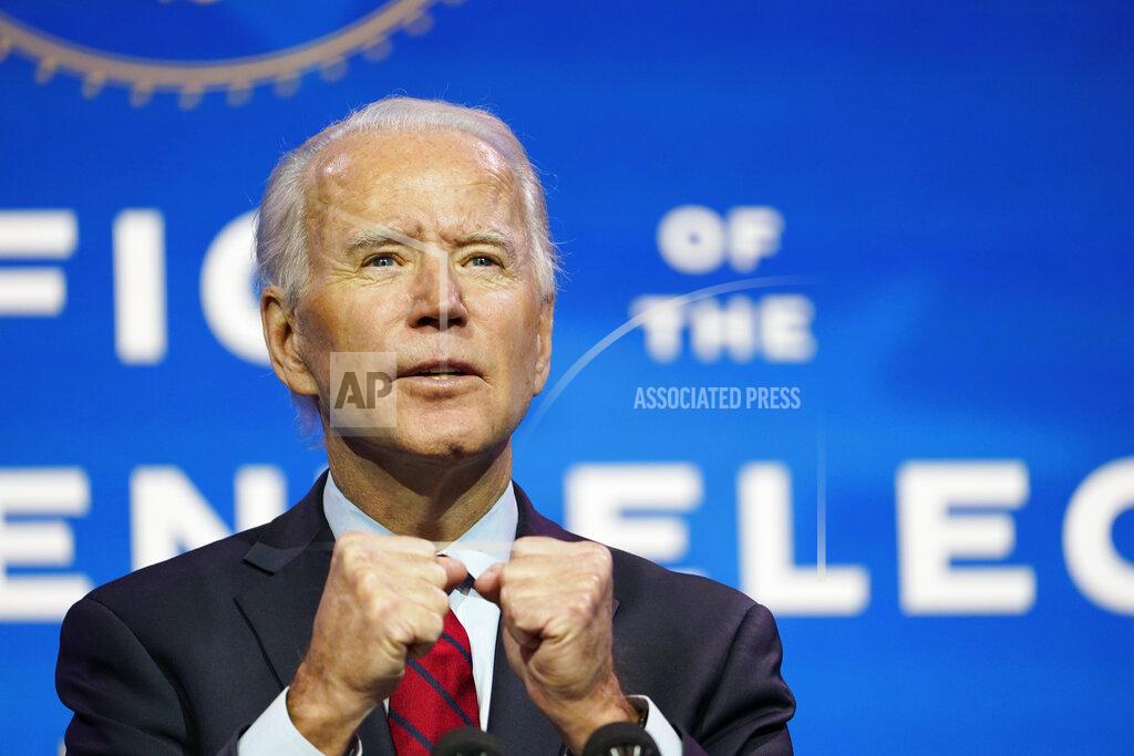 Susan Walsh President-elect Joe Biden speaks during an event at The Queen theater in Wilmington, Del., Tuesday, Dec. 8, 2020, to announce his health care team. (AP Photo/Susan Walsh)