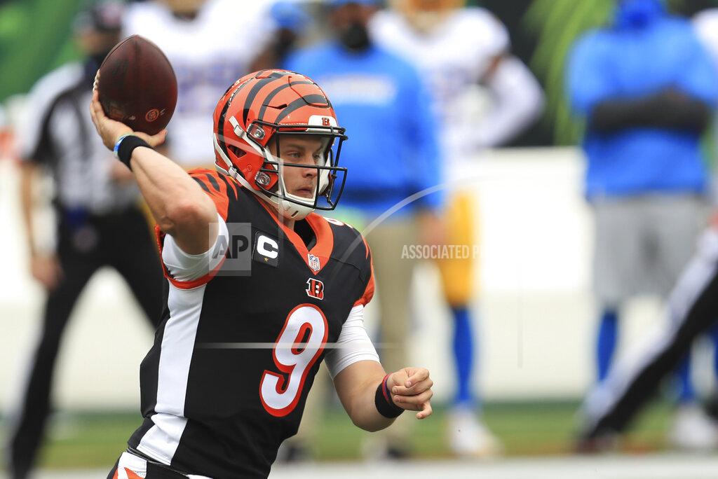Aaron Doster Cincinnati Bengals quarterback Joe Burrow (9) throws during the first half of an NFL football game against the Los Angeles Chargers, Sunday, Sept. 13, 2020, in Cincinnati. (AP Photo/Aaron Doster)