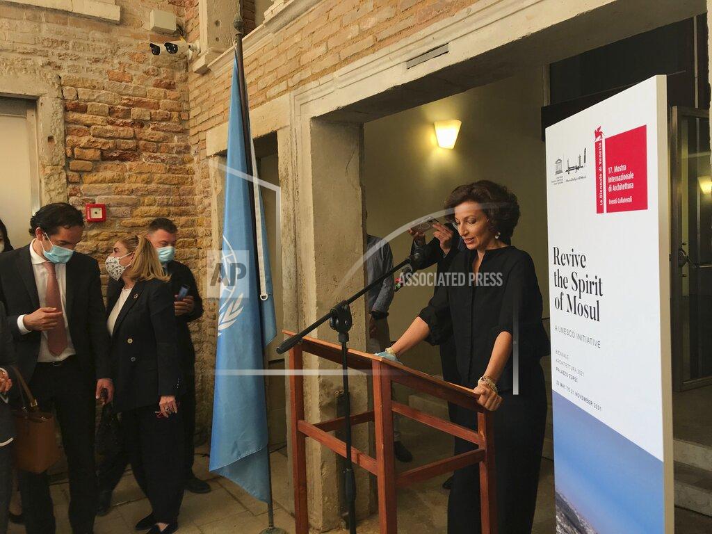 Uncredited Audrey Azoulay, UNESCO's director general, speaks on the occasion of the unveiling of the exhibition " Revive the Spirit of Mosul ", in Venice, Italy Friday, May 21, 2021. The United Nations’ cultural agency has opened an exhibit detailing plans to rebuild the Iraqi city of Mosul that underlines the role of architecture in helping heal wounds. The exhibit is on the sidelines of the 17th International Architecture Exhibition that opened after a one-year pandemic delay Saturday for a six-month run under the title: “How will we live together?” (UNESCO via AP)