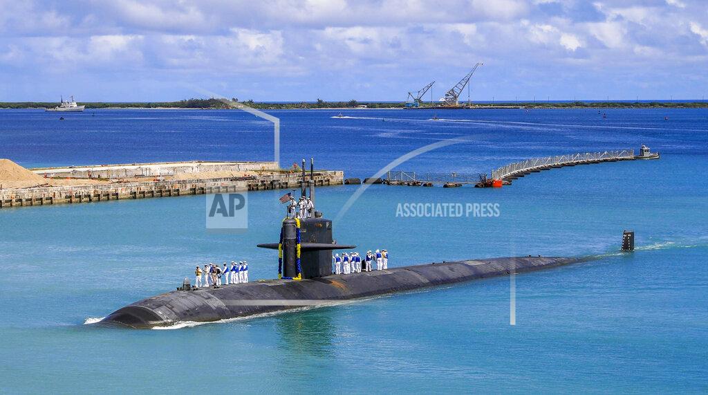 Mc3 Naomi Johnson In this photo provided by U.S. Navy, the Los Angeles-class fast attack submarine USS Oklahoma City (SSN 723) returns to U.S. Naval Base in Guam, Aug. 19, 2021. Australia's Prime Minister Scott Morrison on Friday, Sept. 17, rejected Chinese criticism of Australia's new nuclear submarine alliance with the United States and said he doesn’t mind that President Joe Biden might have forgotten his name. (Mass Communication Specialist 3rd Class Naomi Johnson/U.S. Navy via AP)