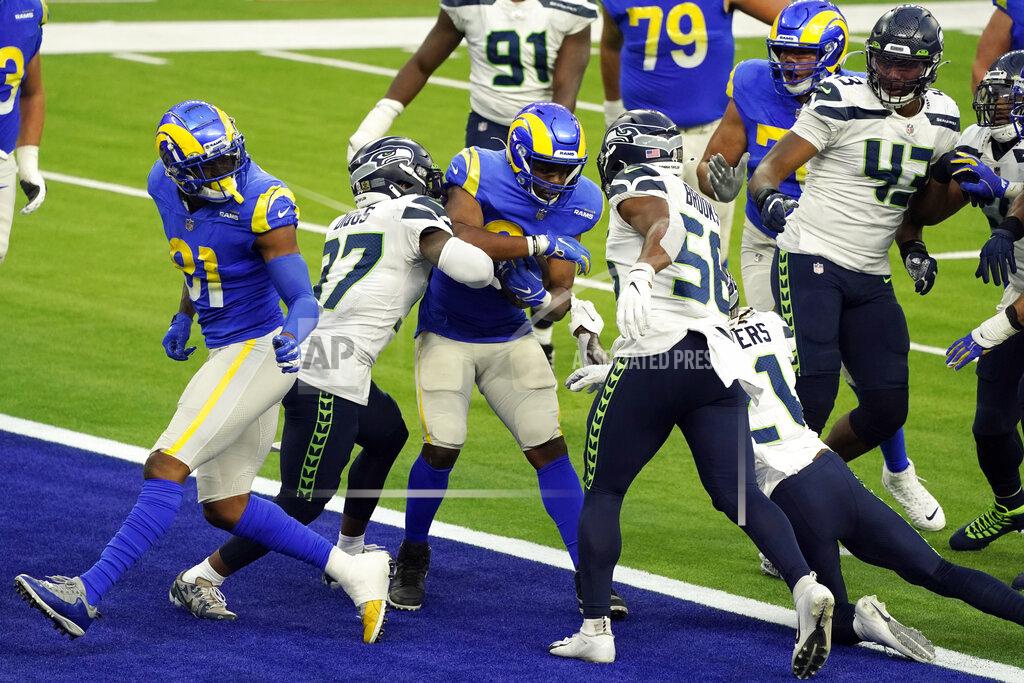 Ashley Landis Los Angeles Rams running back Malcolm Brown, center, scores a rushing touchdown against the Seattle Seahawks during the second half of an NFL football game Sunday, Nov. 15, 2020, in Inglewood, Calif. (AP Photo/Ashley Landis )