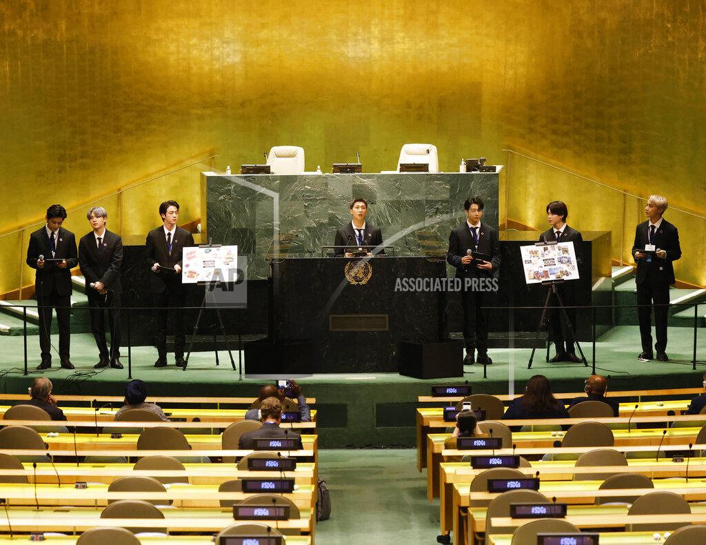 John Angelillo ADDS IDS- Members of South Korean K-pop band BTS, from left, V, Suga, Jin, RM, Jung Kook, Jimin and J-Hope appear at the Sustainable Development Goals meeting during the 76th session of the United Nations General Assembly, at the United Nations Headquarters on Monday, Sept. 20, 2021. (John Angelillo/Pool via AP)