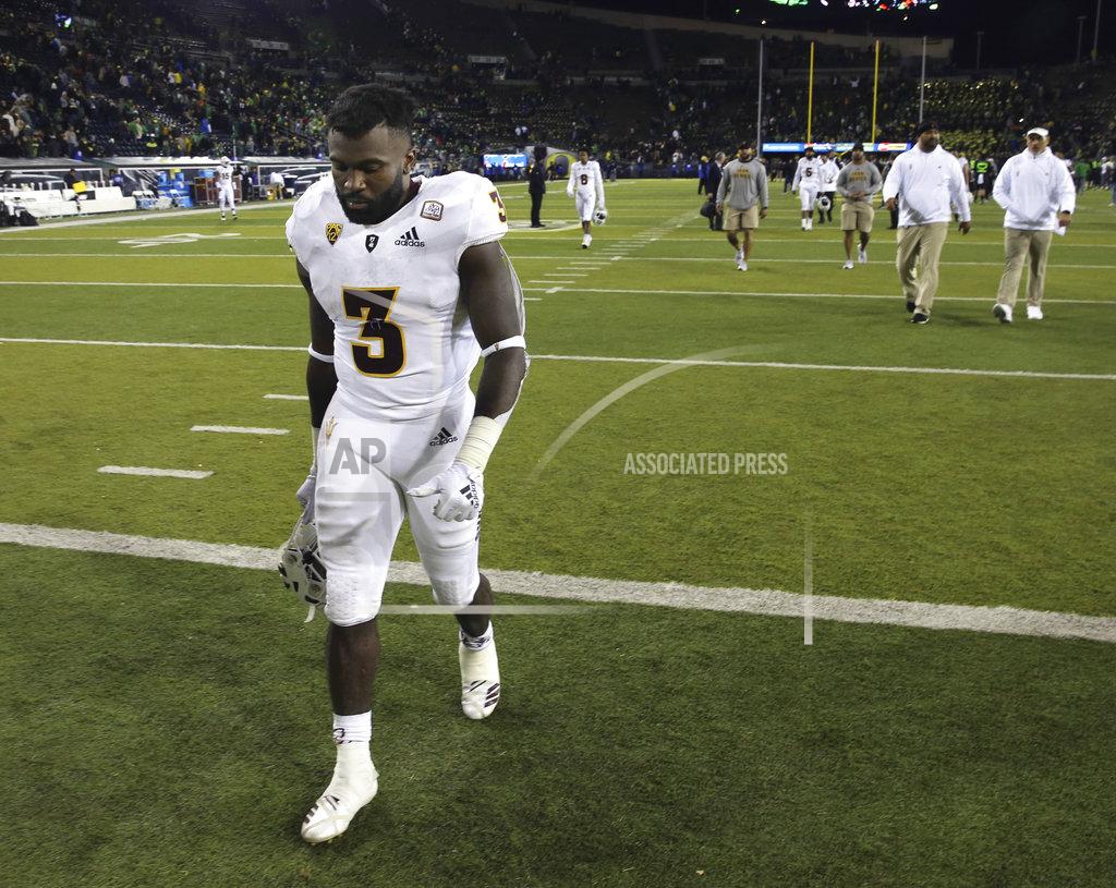 Chris Pietsch Arizona State running back Eno Benjamin leaves the field after the 31-29 lose to Oregon in an NCAA college football game Saturday, Nov. 17, 2018, in Eugene, Ore. (AP Photo/Chris Pietsch)