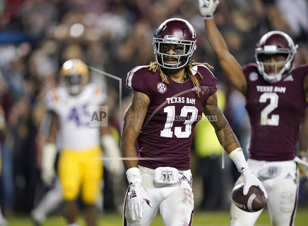 David J. Phillip Texas A&M wide receiver Kendrick Rogers (13) reacts after catching a pass for a two-point conversion during the seventh overtime of an NCAA college football game against LSU Saturday, Nov. 24, 2018, in College Station, Texas. Texas A&M won 74-72. (AP Photo/David J. Phillip)