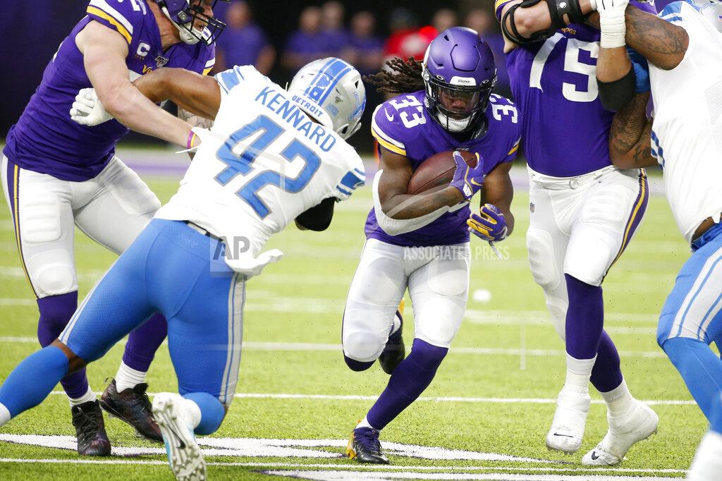 Bruce Kluckhohn Minnesota Vikings running back Dalvin Cook (33) runs from Detroit Lions outside linebacker Devon Kennard (42) during the first half of an NFL football game, Sunday, Dec. 8, 2019, in Minneapolis. (AP Photo/Bruce Kluckhohn)