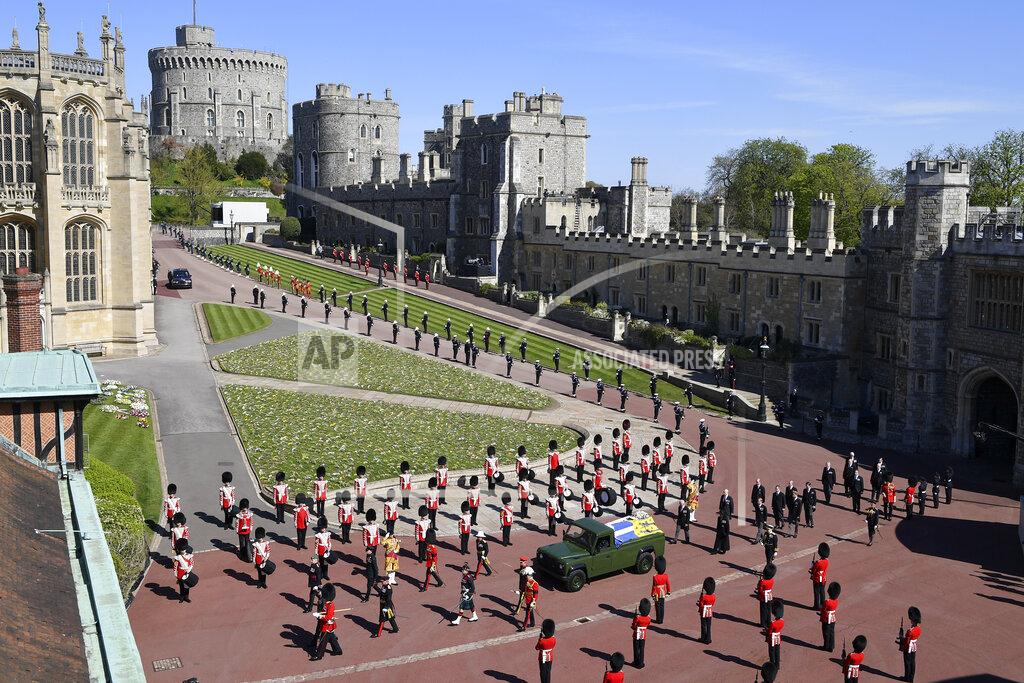 Justin Tallis The coffin arrives at St George's Chapel for the funeral of Britain's Prince Philip inside Windsor Castle in Windsor, England, Saturday, April 17, 2021. Prince Philip died April 9 at the age of 99 after 73 years of marriage to Britain's Queen Elizabeth II. (Justin Tallis/Pool via AP)