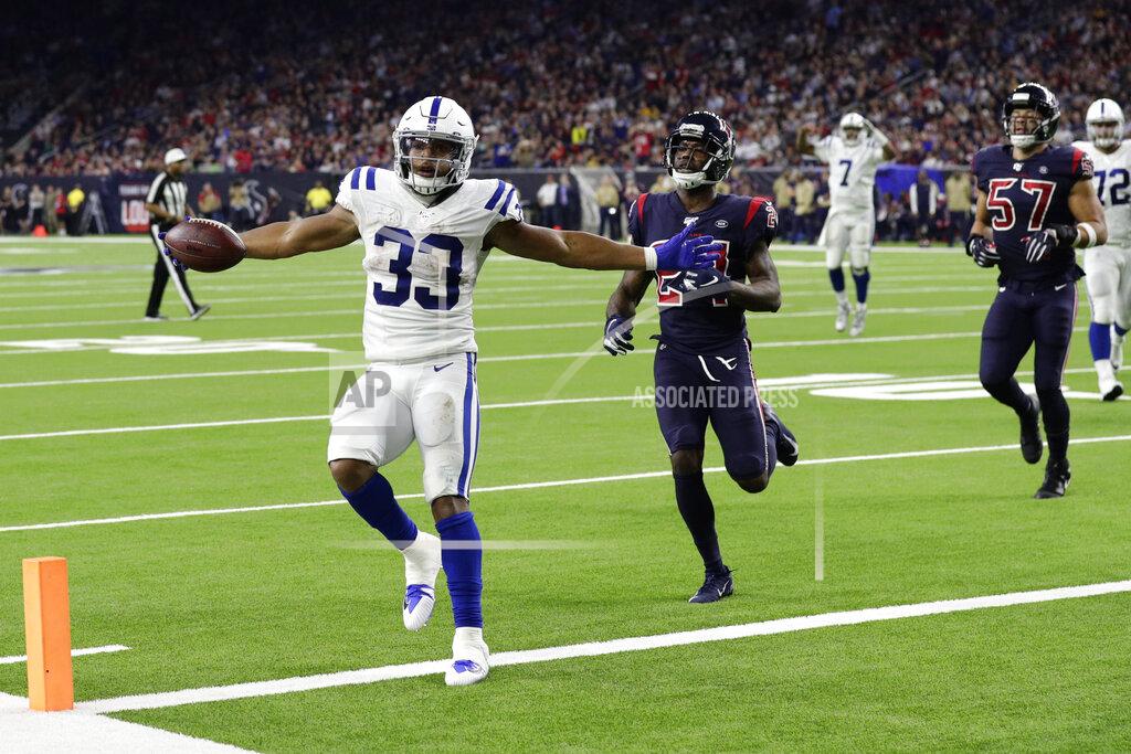 Mike Marshall Indianapolis Colts running back Jonathan Williams (33) celebrates as he scores a touchdown against the Houston Texans during the second half of an NFL football game Thursday, Nov. 21, 2019, in Houston. (AP Photo/Mike Marshall)
