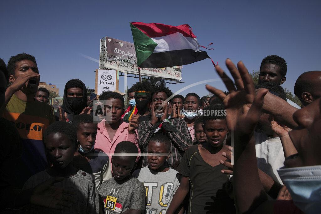Marwan Ali Thousands of protesters take to the streets to renew their demand for a civilian government in the Sudanese capital Khartoum, Thursday, Nov. 25, 2021. The rallies came just days after the military signed a power-sharing deal with the prime minister, after releasing him from house arrest and reinstating him as head of government. The deal came almost a month after the generals orchestrated a coup. Sudan’s key pro-democracy groups and political parties have dismissed the deal as falling short of their demands for a fully civilian rule. (AP Photo/Marwan Ali)