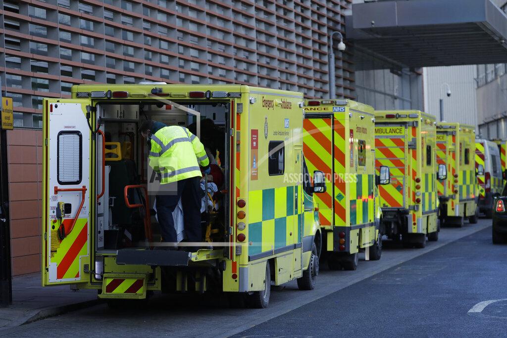 Matt Dunham A patient arrives in an ambulance outside the Royal London Hospital in east London, Monday, Jan. 25, 2021, during England's third national lockdown since the coronavirus outbreak began. The U.K. is under an indefinite national lockdown to curb the spread of the new variant, with nonessential shops, gyms and hairdressers closed, most people working from home and schools largely offering remote learning. (AP Photo/Matt Dunham)