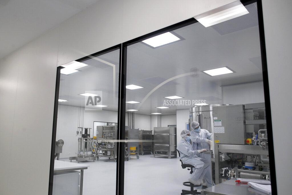 Natacha Pisarenko FILE - In this Aug. 14, 2020, file photo, laboratory technicians work at the mAbxience biopharmaceutical company on an experimental coronavirus vaccine developed by Oxford University and the laboratory AstraZeneca in Garin, Argentina. AstraZeneca announced Monday, Aug. 31, its vaccine candidate has entered the final testing stage in the U.S. (AP Photo/Natacha Pisarenko, File)