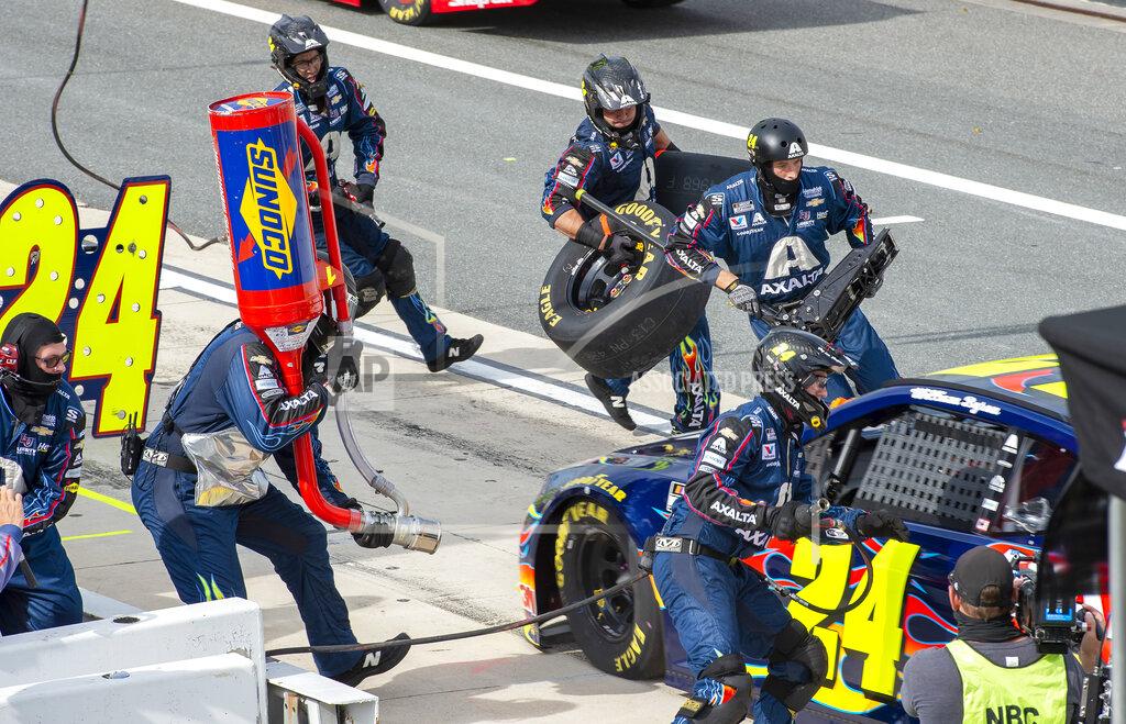 Jason Minto William Byron (24) pits during a NASCAR Cup Series auto race at Dover International Speedway, Saturday, Aug. 22, 2020, in Dover, Del. (AP Photo/Jason Minto)