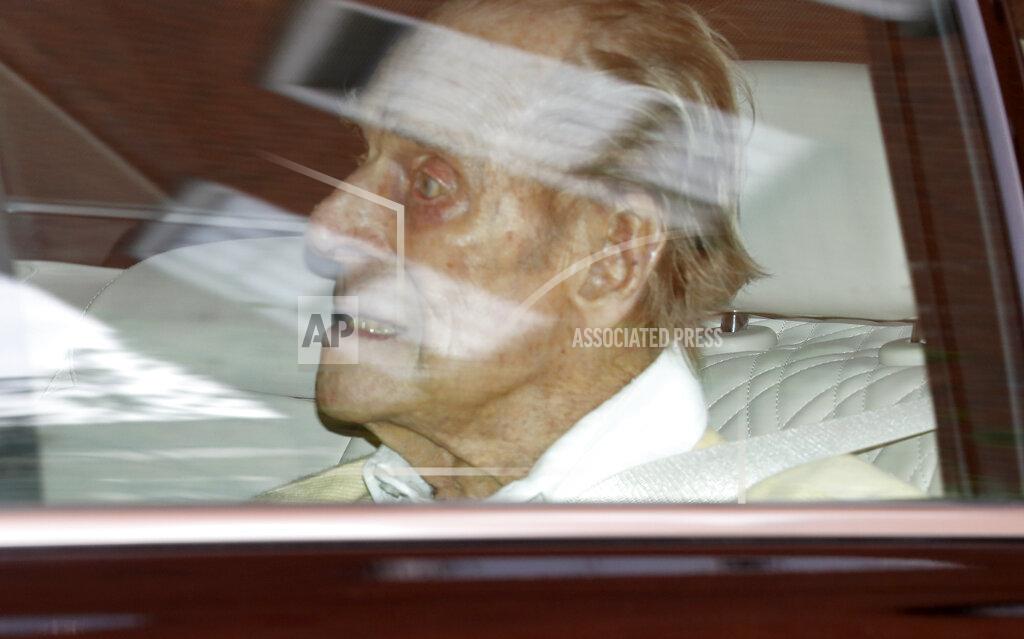 Alastair Grant Britain's Prince Philip leaves the King Edward VII hospital in the back of a car in London, Tuesday, March 16, 2021. The 99-year-old husband of Queen Elizabeth II has been hospitalized after a heart procedure. (AP Photo/Alastair Grant)
