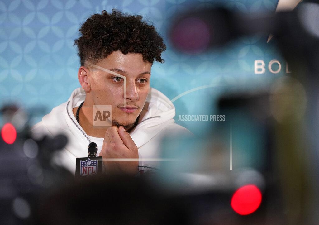 David J. Phillip Kansas City Chiefs' Patrick Mahomes speaks to reporters during Opening Night for the NFL Super Bowl 54 football game Monday, Jan. 27, 2020, at Marlins Park in Miami. (AP Photo/David J. Phillip)
