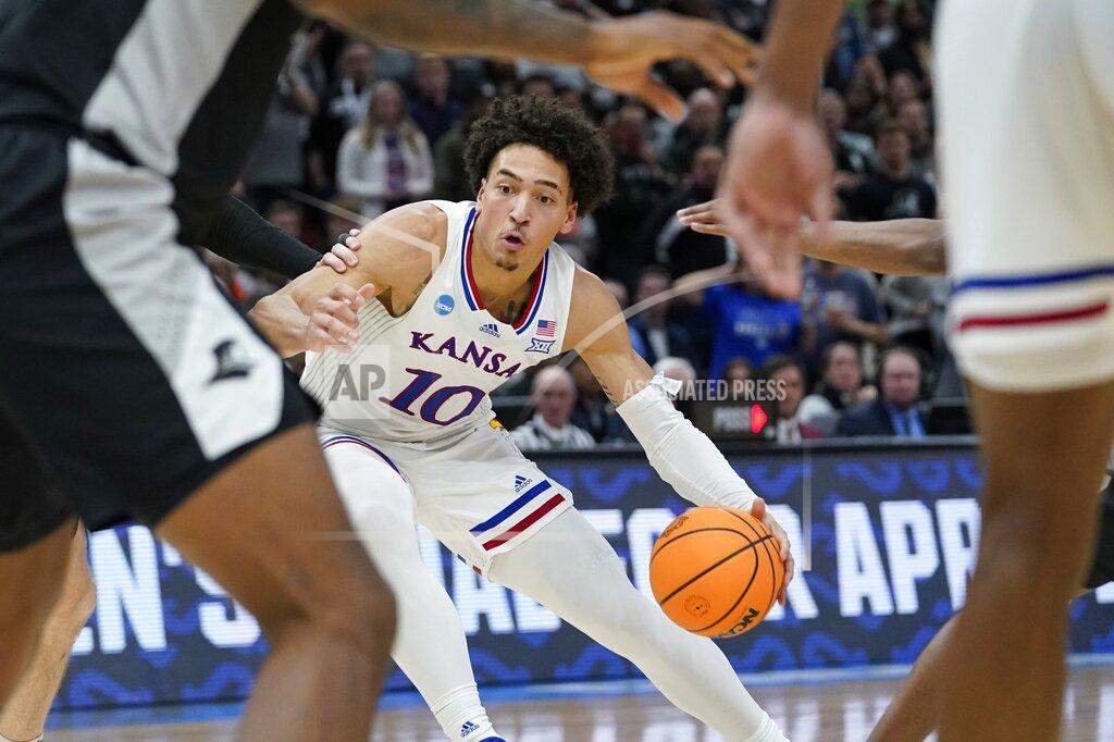 Nam Y. Huh Kansas' Jalen Wilson drives during the second half of a college basketball game in the Sweet 16 round of the NCAA tournament Friday, March 25, 2022, in Chicago. (AP Photo/Nam Y. Huh)