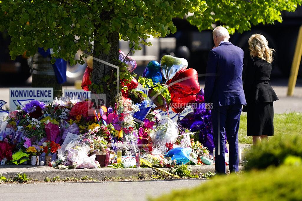 Matt Rourke President Joe Biden and first lady Jill Biden visit the scene of a shooting at a supermarket to pay respects and speak to families of the victims of Saturday's shooting in Buffalo, N.Y., Tuesday, May 17, 2022. (AP Photo/Matt Rourke)