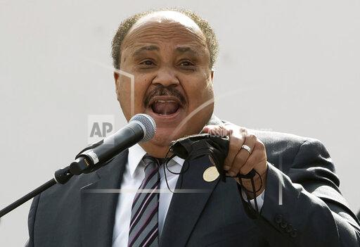 Martin Luther King III, with the Deliver For Voting Rights organization, wraps up his speech at the Eastlake Park Amphitheater in Phoenix on Saturday, Jan. 15, 2022. As the nation prepares to mark the birthday of the Rev. Martin Luther King Jr., some members of his family are spending it in conservative-leaning Arizona to mobilize support for languishing federal voting rights legislation. (Zac BonDurant/The Arizona Republic via AP)
