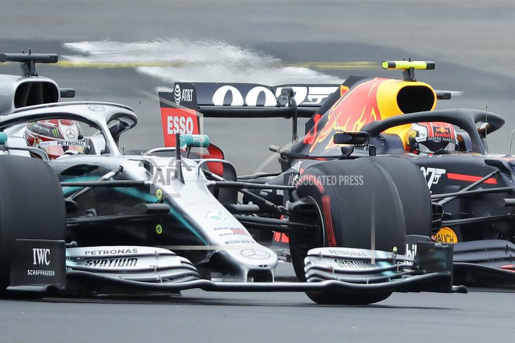 Luca Bruno Mercedes driver Lewis Hamilton of Britain, front, steers his car followed by Red Bull driver Pierre Gasly of France during the third free practice at the Silverstone racetrack, in Silverstone, England, Saturday, July 13, 2019. The British Formula One Grand Prix will be held on Sunday. (AP Photo/Luca Bruno)