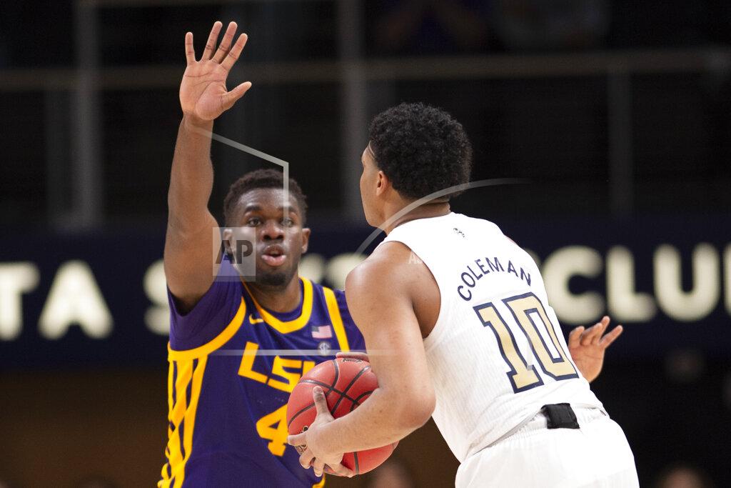 Hakim Wright Sr. LSU forward Darius Days (4) defends against Georgia Tech guard Dallan Coleman (10) during the second half of an NCAA college basketball game Saturday, Dec. 11, 2021, in Atlanta. (AP Photo/Hakim Wright Sr.)