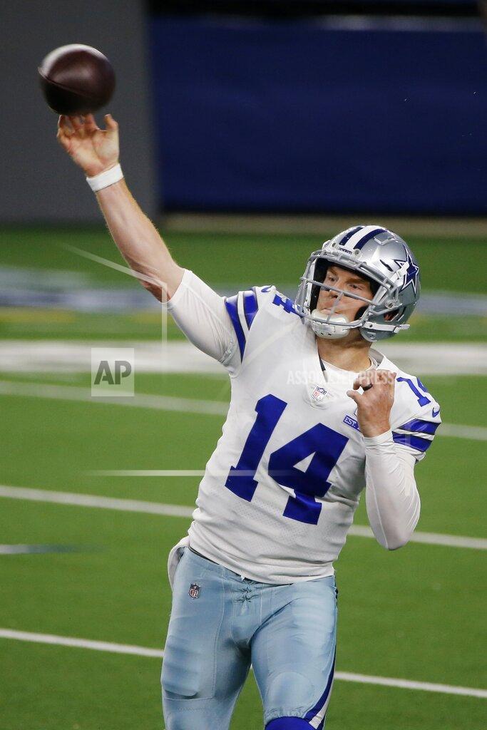 Michael Ainsworth Dallas Cowboys quarterback Andy Dalton (14) throws a pass in the first half of an NFL football game against the Arizona Cardinals in Arlington, Texas, Monday, Oct. 19, 2020. (AP Photo/Michael Ainsworth)