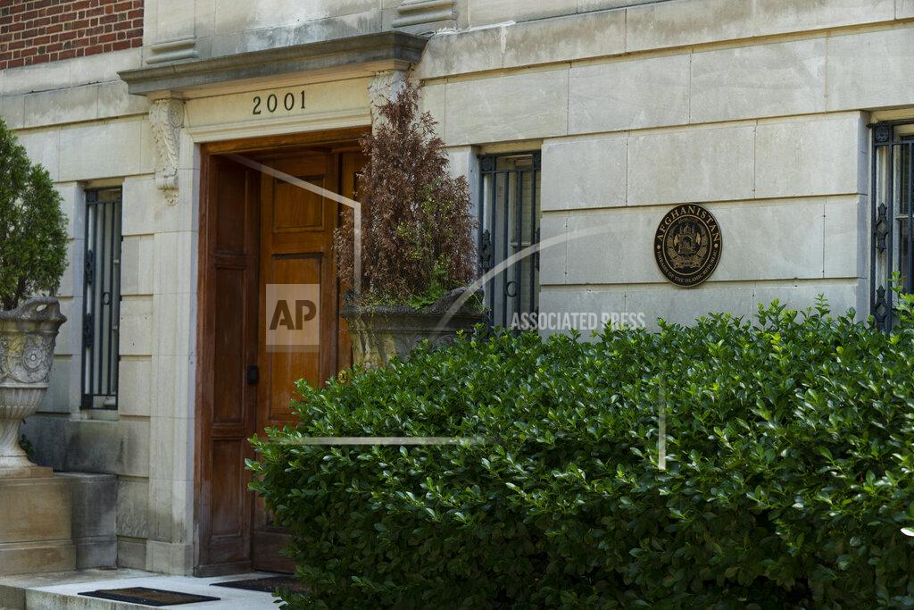 Manuel Balce Ceneta The main entrance to the embassy of the Islamic Republic of Afghanistan in Washington, Tuesday, May 17, 2022. The United States has taken control of Afghanistan's embassy in Washington and the country's consulates in New York and California. The State Department says it had assumed "sole responsibility" for the security and maintenance of the diplomatic missions effective on Monday and will bar anyone from entering them without its permission. The move came after the department said the embassy and consulates had "formally ceased conducting diplomatic and consular activities in the United States." (AP Photo/Manuel Balce Ceneta)