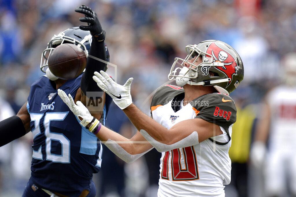 Mark Zaleski Tampa Bay Buccaneers wide receiver Scott Miller (10) catches a pass as he is defended by Tennessee Titans cornerback Logan Ryan (26) in the first half of an NFL football game Sunday, Oct. 27, 2019, in Nashville, Tenn. (AP Photo/Mark Zaleski)