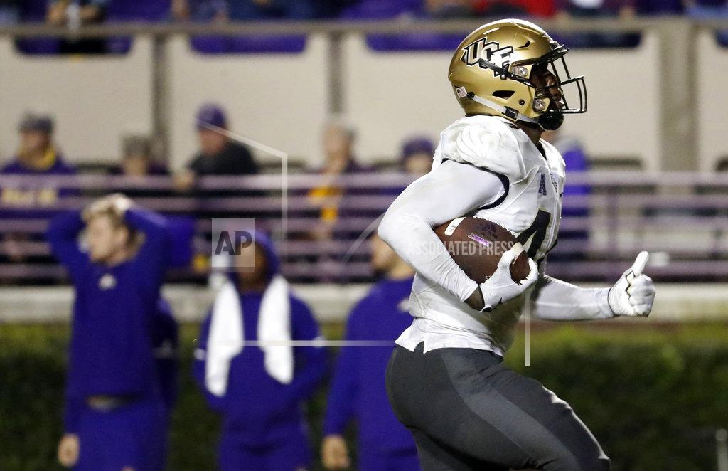 Karl B Deblaker Central Florida's Nate Evans (44) returns a fumble for a touchdown during the second half of an NCAA college football game against East Carolina in Greenville, N.C., Saturday, Oct. 20, 2018. UCF won 37-10. (AP Photo/Karl B DeBlaker)
