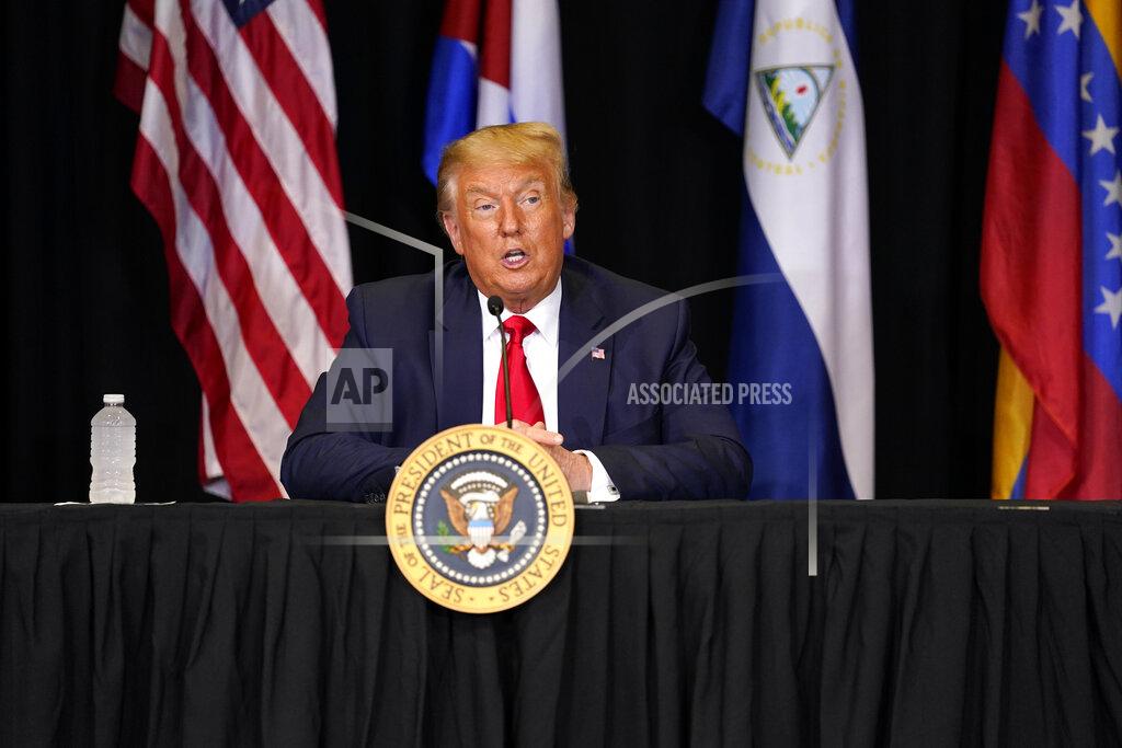 Evan Vucci President Donald Trump speaks during a roundtable on Venezuela at Iglesia Doral Jesus Worship Center, Friday, July 10, 2020, in Doral, Fla. (AP Photo/Evan Vucci)